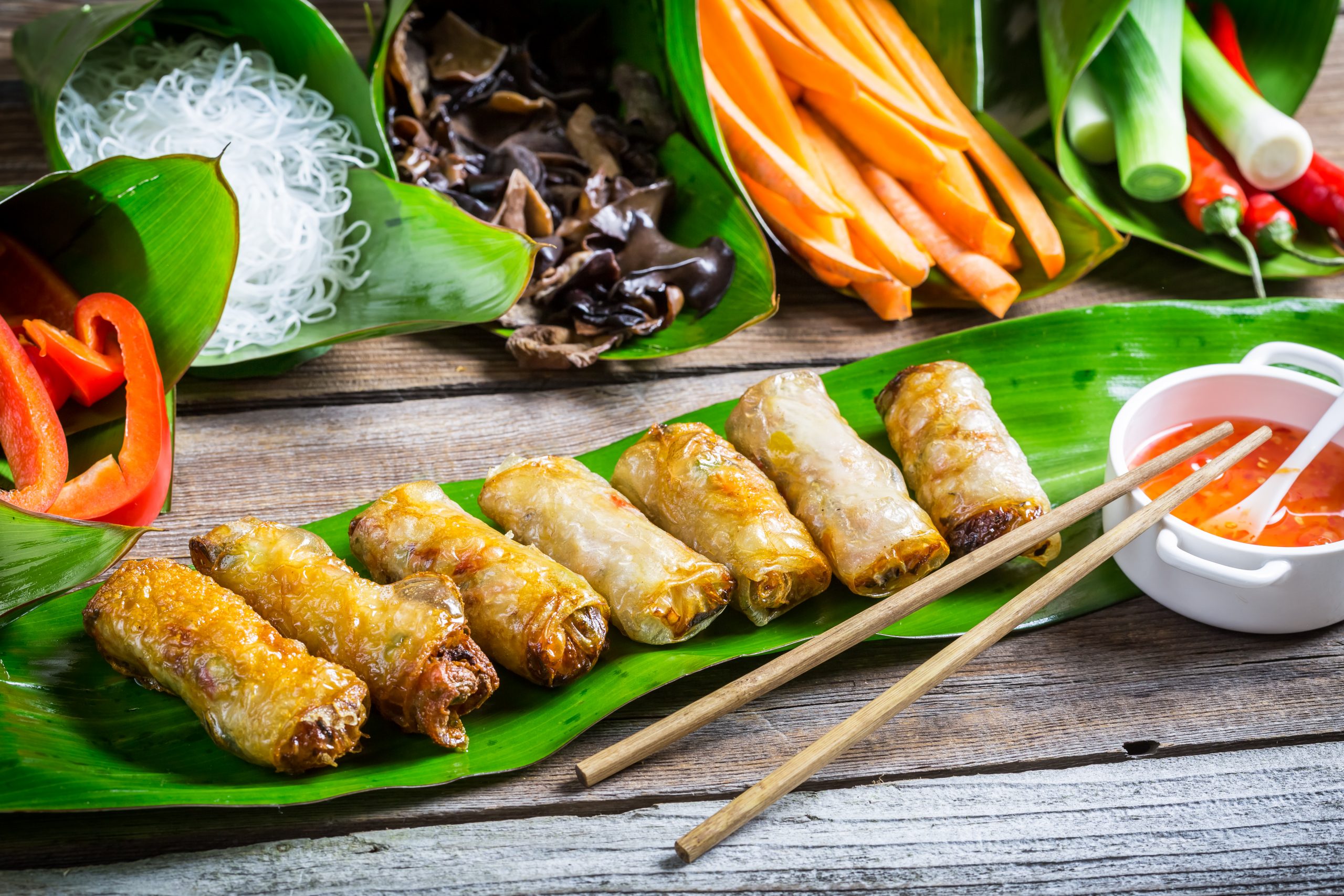 Picture of Spring rolls on a banana leaf