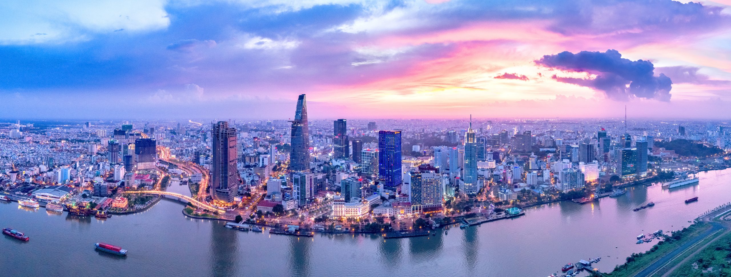 Aerial view of Saigon at sunset. river and city view