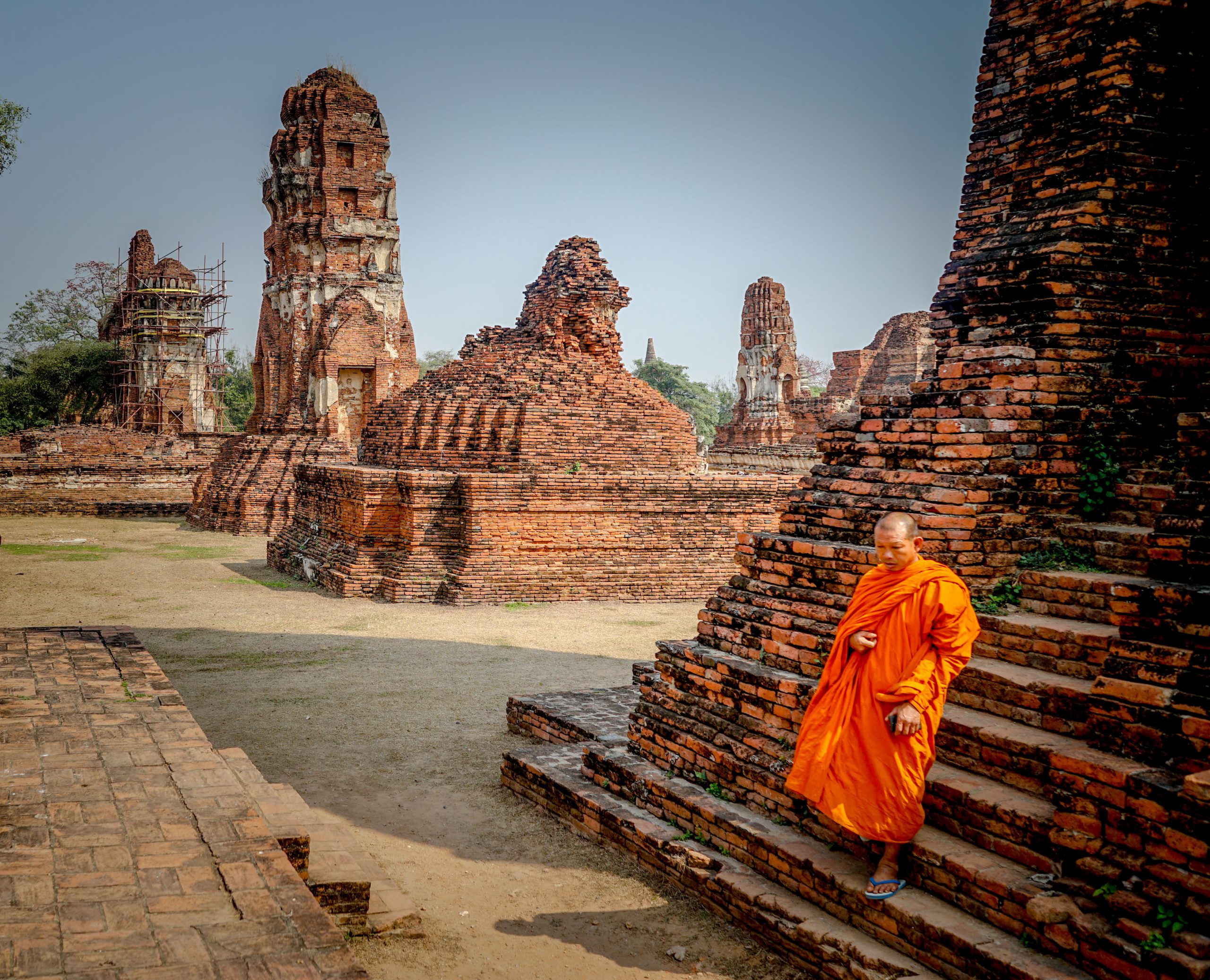 Buddhist Monk descending temple steps, Ayutthaya