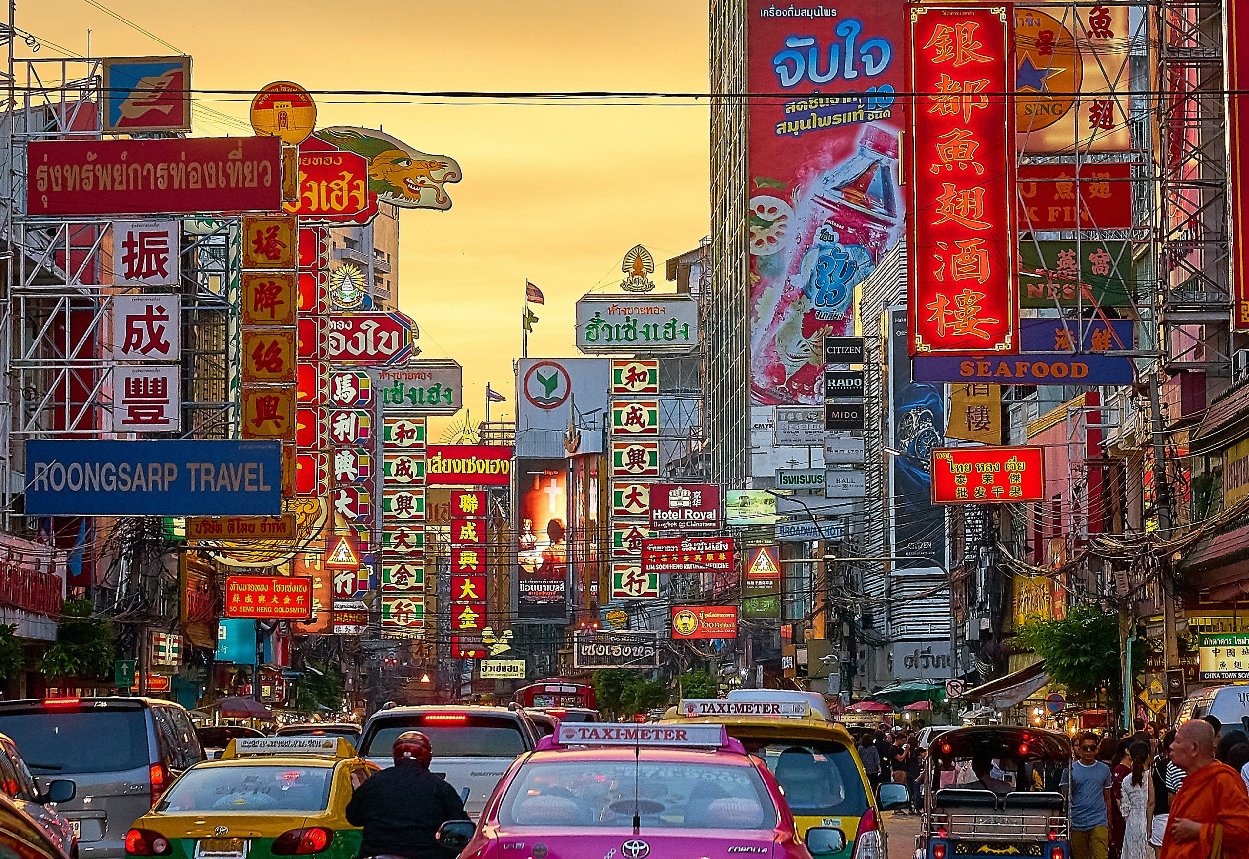 Sunset picture of traffic and advertising hoardings, Chinatown, Bangkok