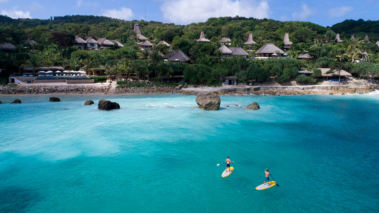 Paddle boarders infront of Nihi Sumba