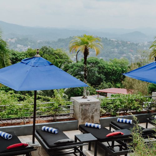 Sunloungers with view at Theva Residency